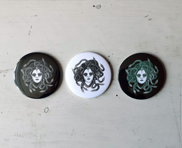 Set of pocket mirrors representing Medusa